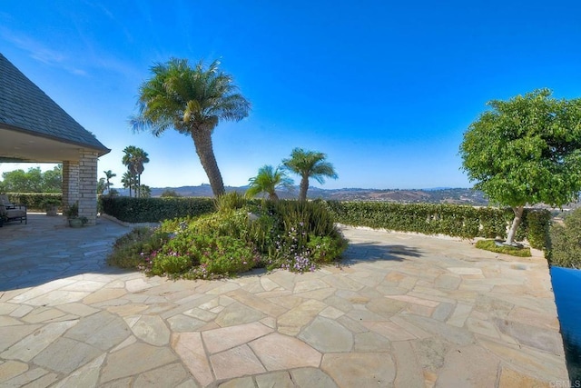 view of patio with a mountain view