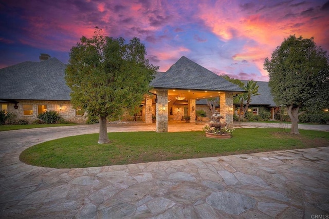 31350 Lake Vista Cir, Bonsall, CA 92003 - view of front of house with stone siding, curved driveway, and a yard