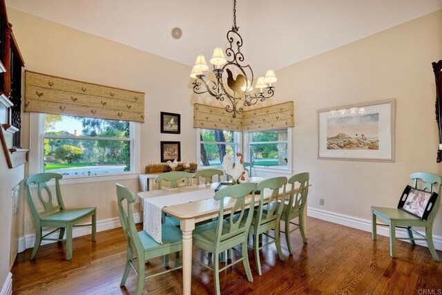 31350 Lake Vista Cir, Bonsall, CA 92003 - dining room with wood finished floors, baseboards, and a chandelier