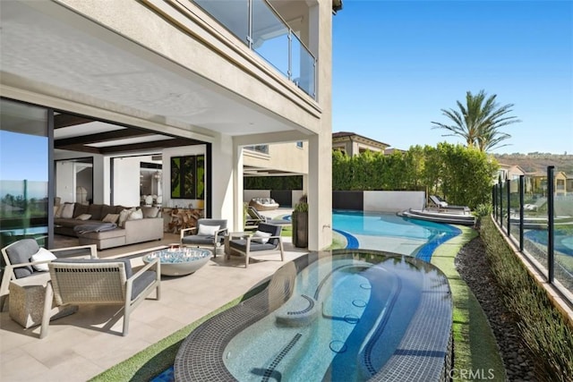 view of patio featuring an outdoor pool and an outdoor hangout area