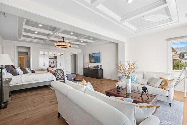 interior space featuring coffered ceiling, wood finished floors, and recessed lighting