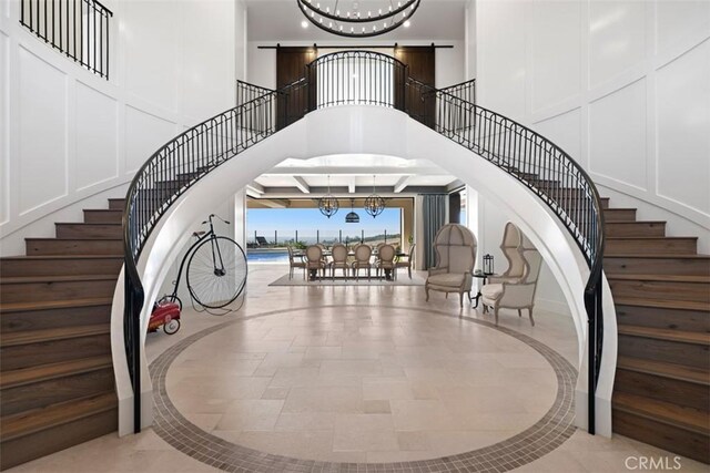 foyer with a notable chandelier