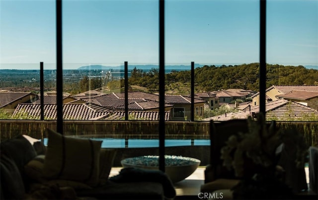 view of swimming pool with a residential view