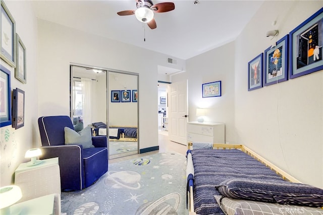 bedroom featuring a closet and ceiling fan