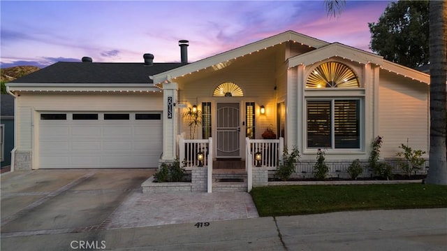 view of front of home with a garage