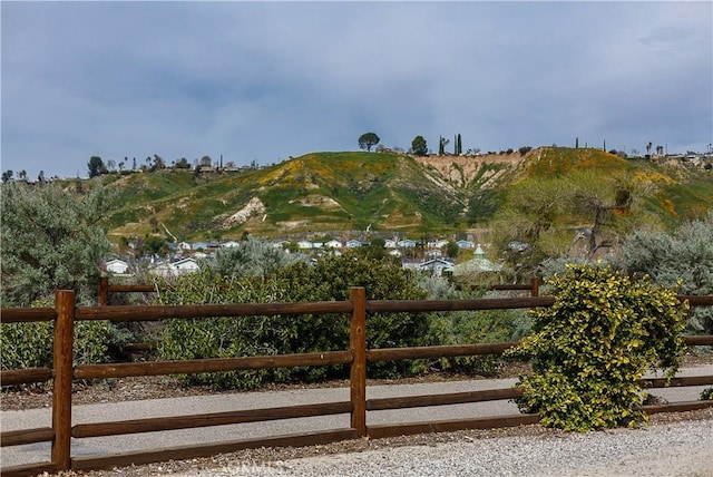 view of gate with a mountain view