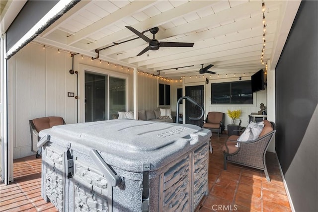 view of patio with a hot tub