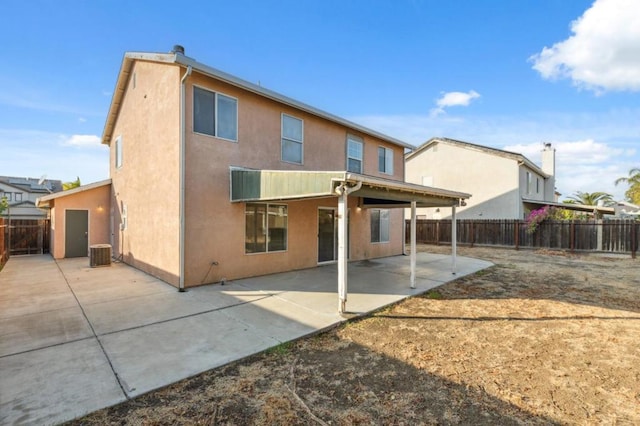 rear view of house with a patio area