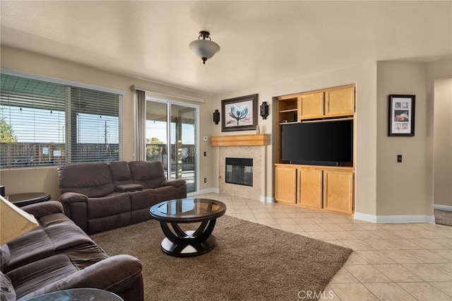 living room featuring a healthy amount of sunlight and light tile patterned flooring