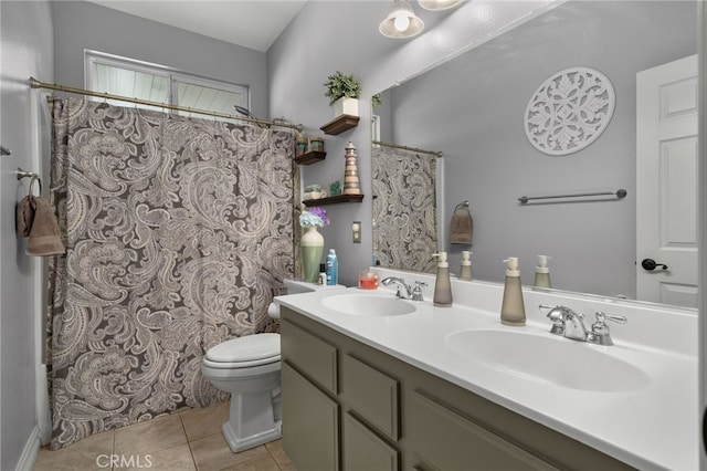 bathroom featuring tile patterned floors, vanity, toilet, and a shower with shower curtain