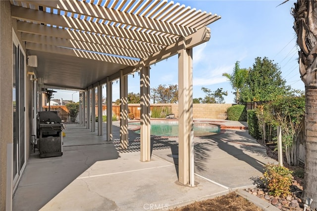 view of patio / terrace with a grill, a fenced in pool, and a pergola