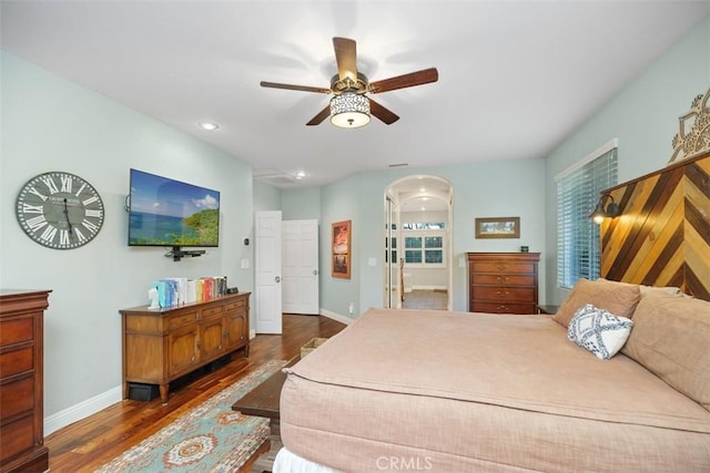 45600 La Cruz Dr, Temecula, CA 92590 - bedroom with wood finished floors, recessed lighting, arched walkways, and a ceiling fan