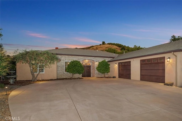 view of front of home with a garage