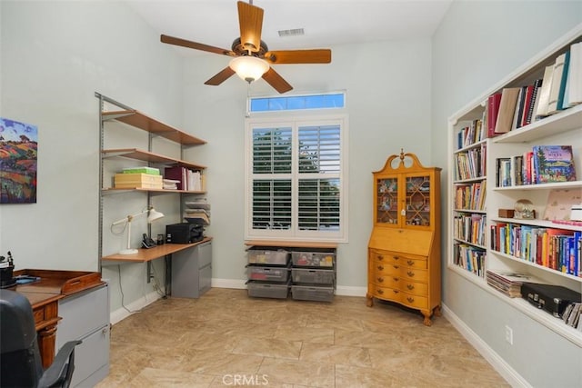 office area with ceiling fan