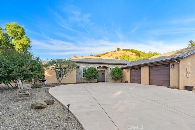 single story home with a garage