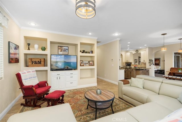 tiled living room featuring built in shelves and crown molding