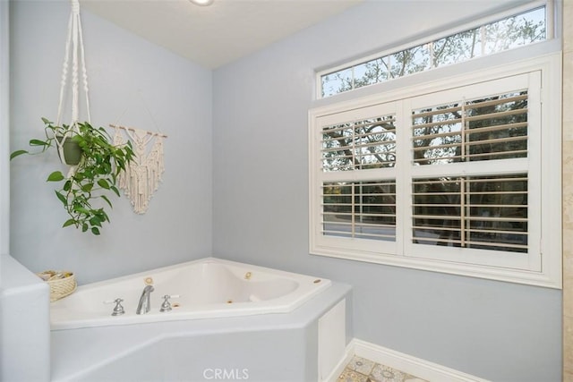 bathroom featuring a washtub