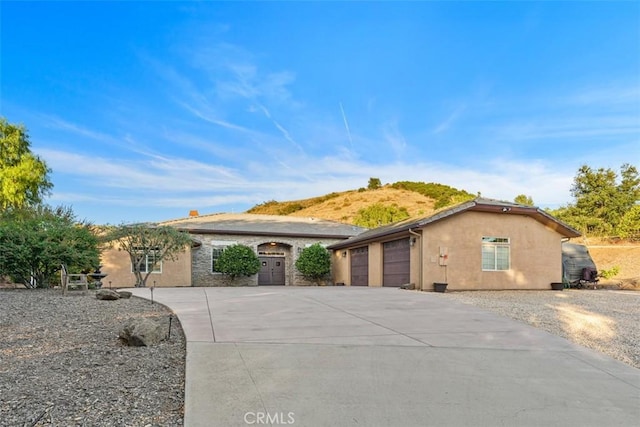 ranch-style home with a garage