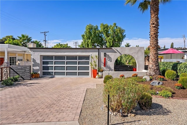 view of front of property with a garage