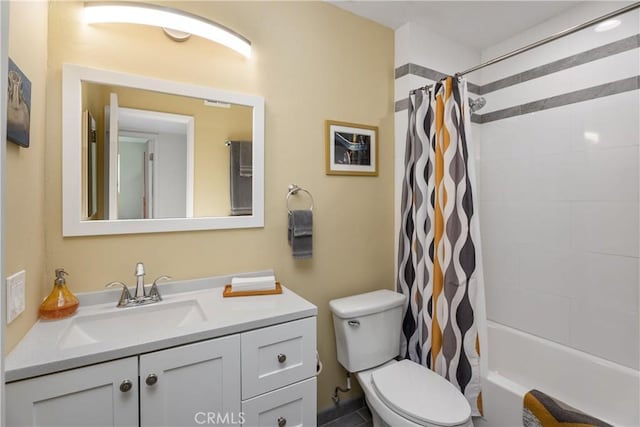 full bathroom with toilet, vanity, and shower / tub combo