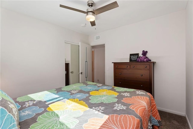 bedroom with ceiling fan and carpet