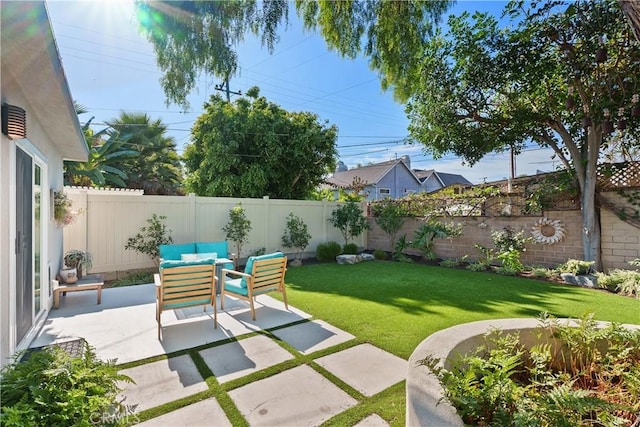 view of yard with an outdoor hangout area and a patio area