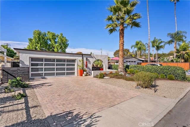 view of front of property featuring a garage