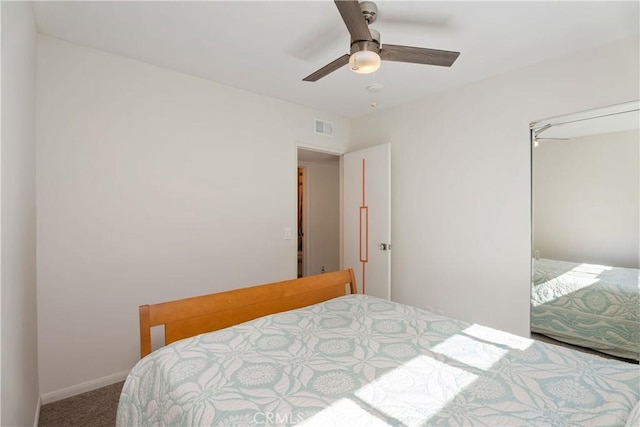 bedroom featuring ceiling fan and carpet flooring