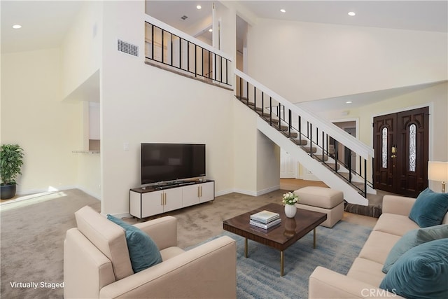 living room featuring high vaulted ceiling and light colored carpet