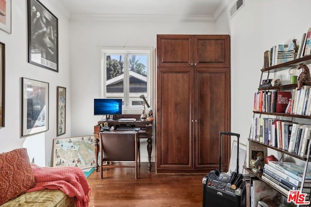 office space featuring crown molding and dark wood-type flooring