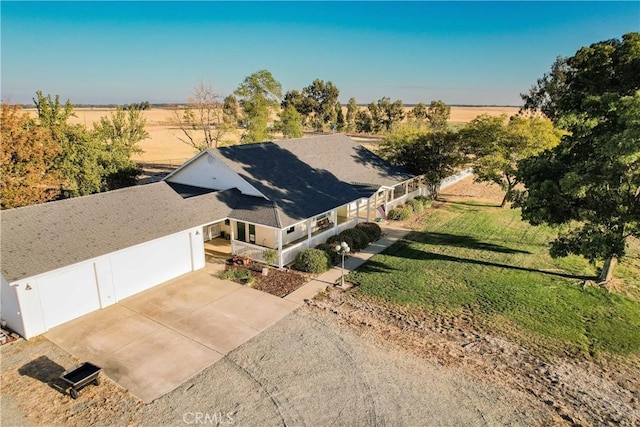 birds eye view of property featuring a rural view