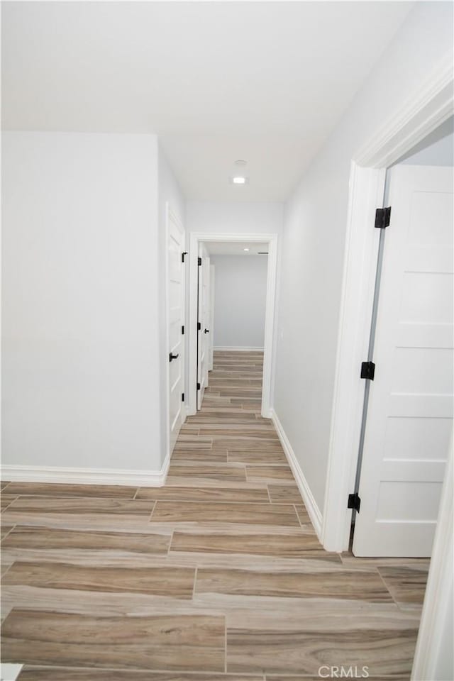 hallway featuring light hardwood / wood-style floors