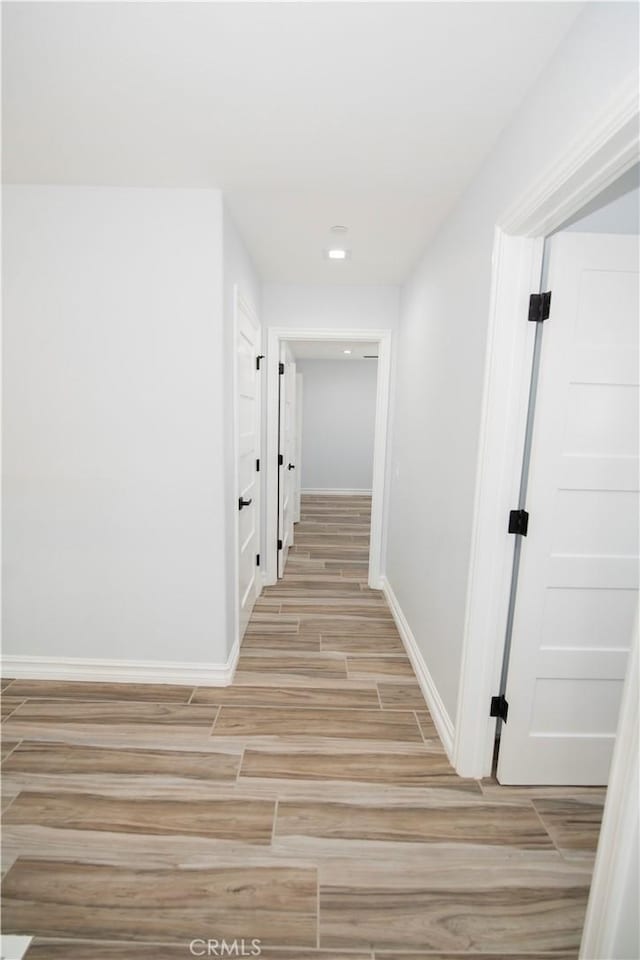 27404 Outrigger Ln, Helendale, CA 92342 - corridor with light wood-style floors, baseboards, and recessed lighting