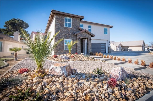 view of front of property with a garage