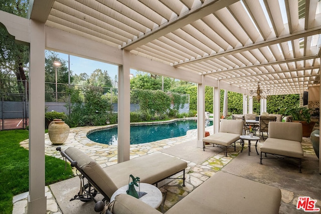 view of pool featuring a patio area