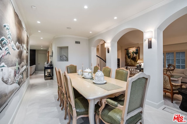 dining room with ornamental molding