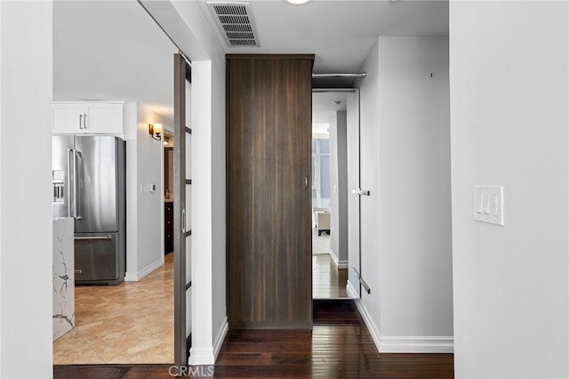 hallway featuring light hardwood / wood-style flooring