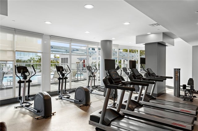 exercise room with expansive windows