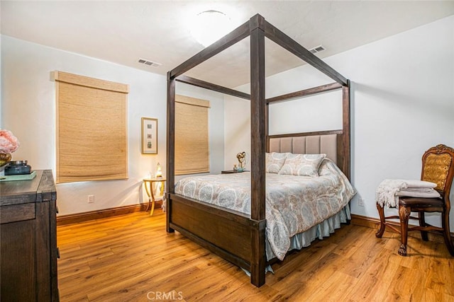 bedroom featuring light hardwood / wood-style floors