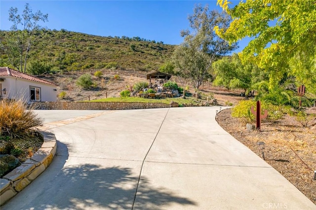 exterior space featuring a mountain view