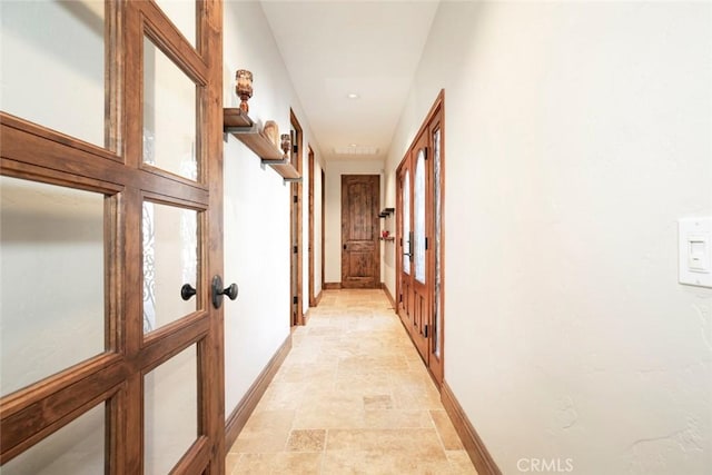 hallway featuring french doors