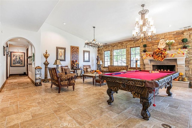 recreation room with lofted ceiling and pool table