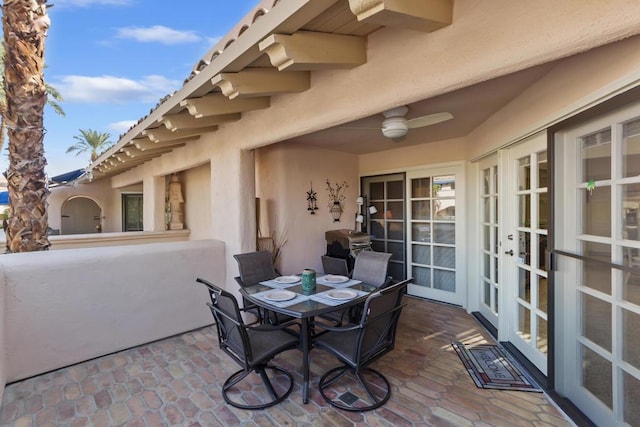 view of patio / terrace featuring grilling area, french doors, and ceiling fan