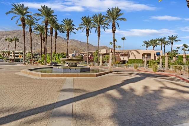 surrounding community featuring a mountain view