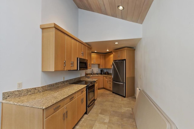 kitchen with sink, high vaulted ceiling, wooden ceiling, appliances with stainless steel finishes, and light stone countertops