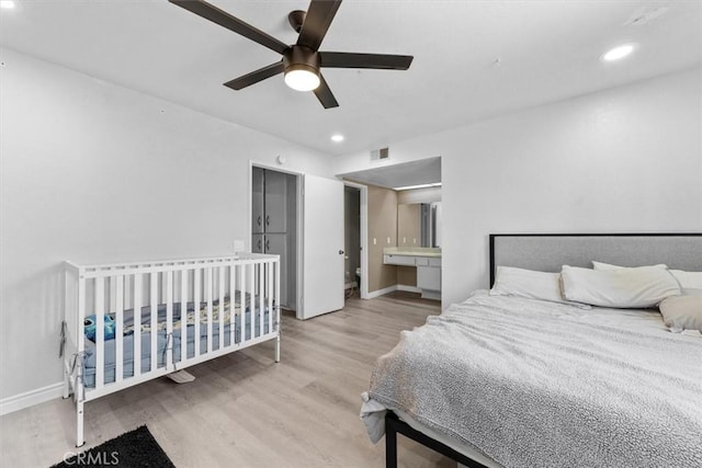 bedroom with ceiling fan, recessed lighting, wood finished floors, visible vents, and baseboards