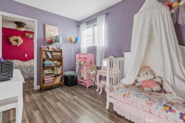 bedroom featuring wood-type flooring