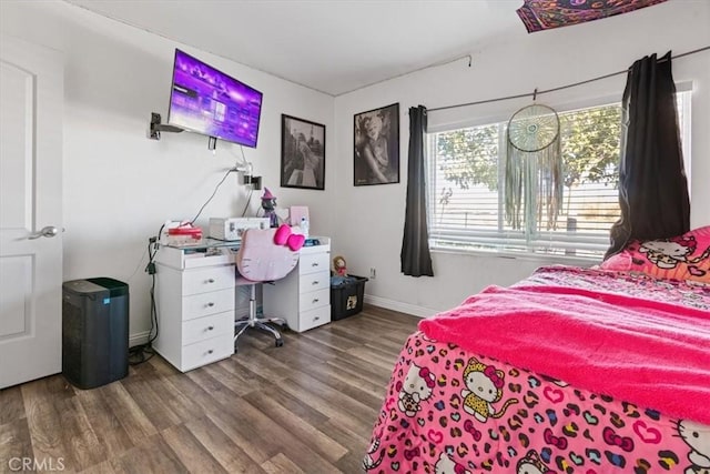 bedroom featuring hardwood / wood-style flooring