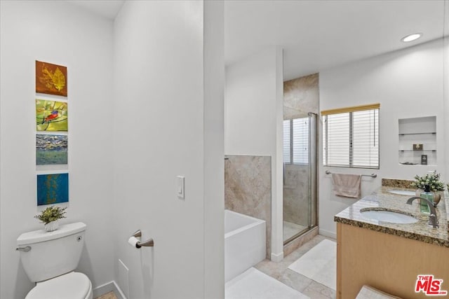 full bathroom featuring separate shower and tub, tile patterned flooring, vanity, and toilet