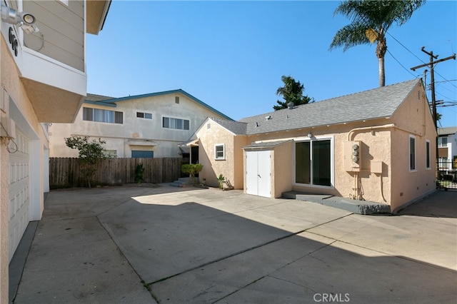 rear view of house featuring a patio